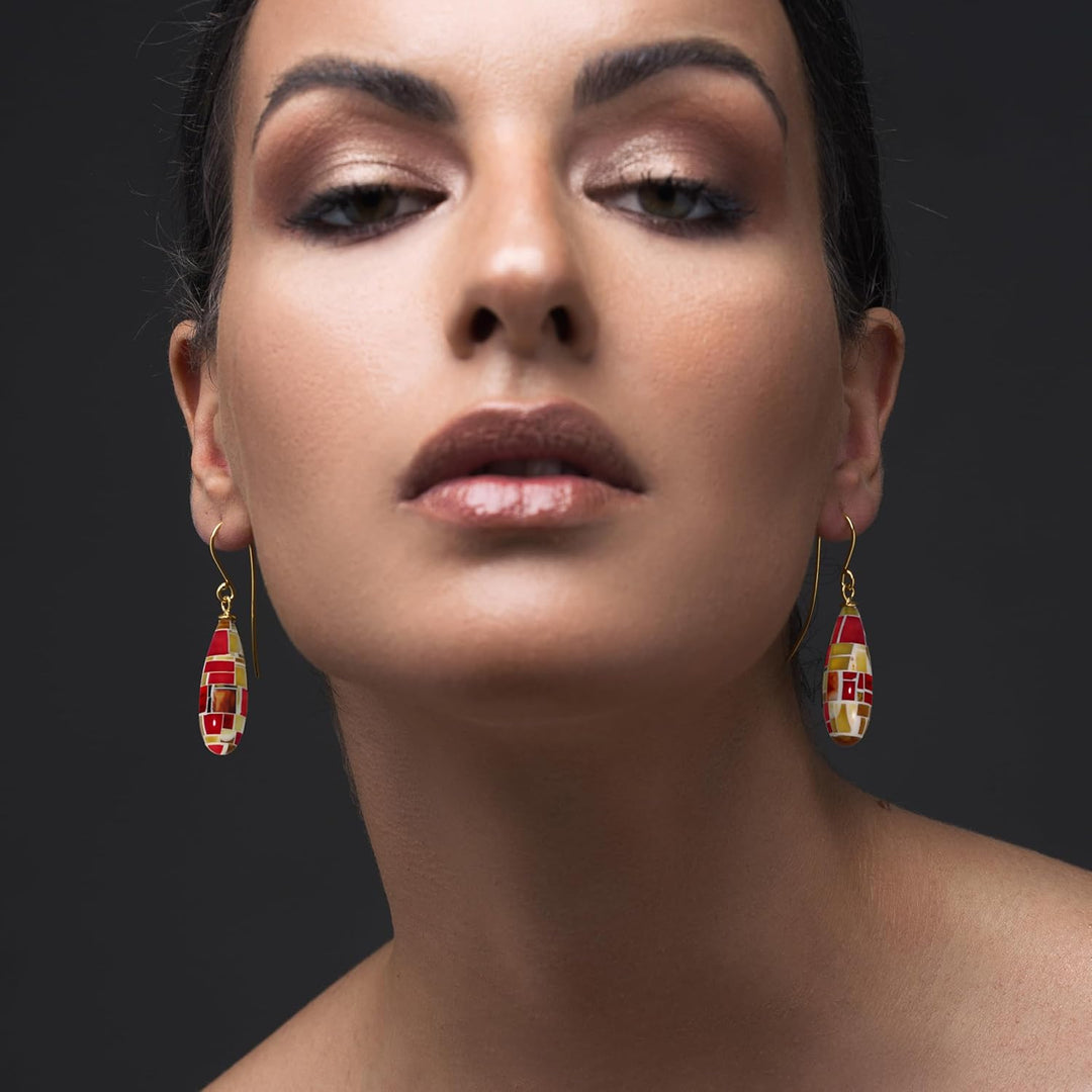 Earrings with amber chips